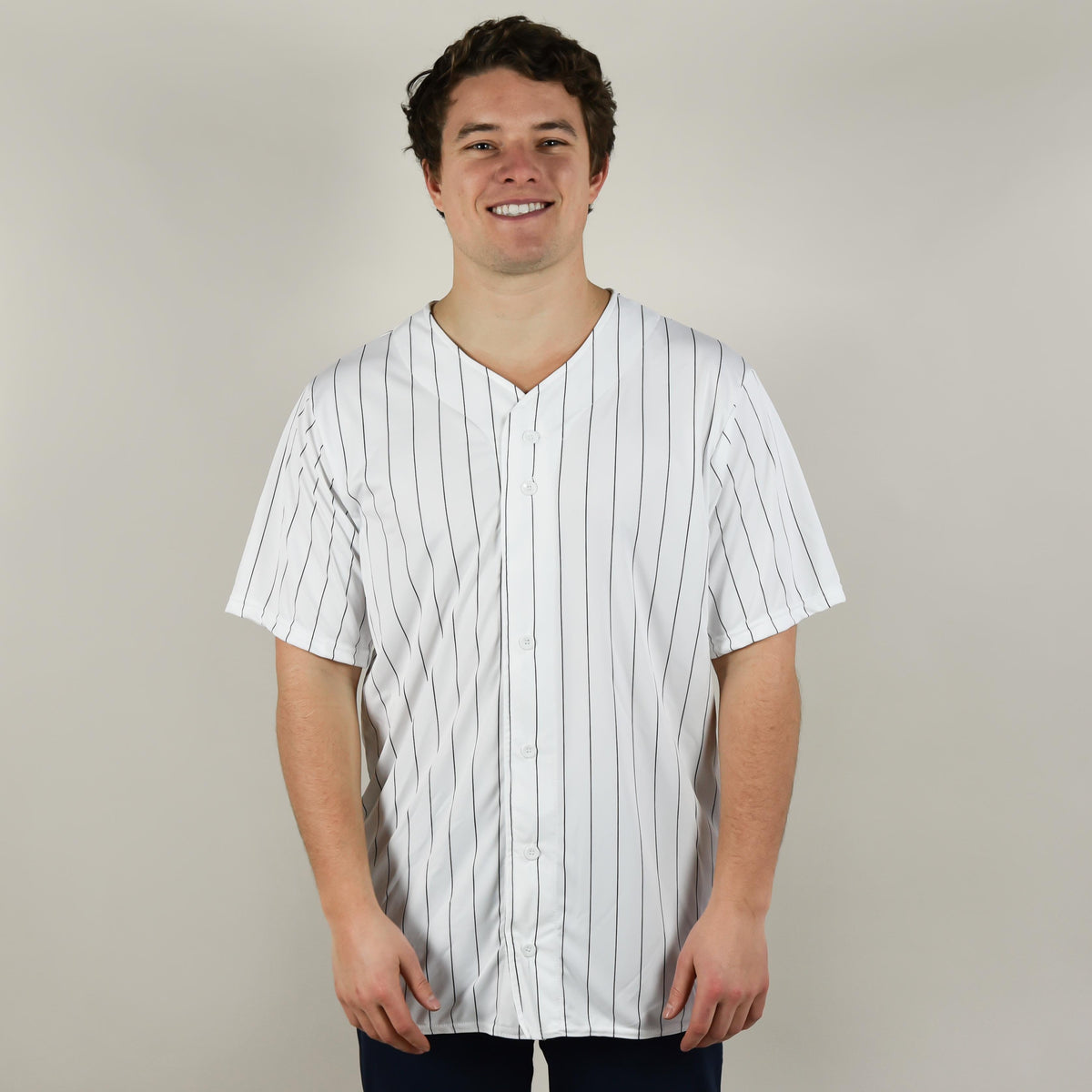Model wearing Augusta 1685 Full Button Pinstripe Baseball Jersey