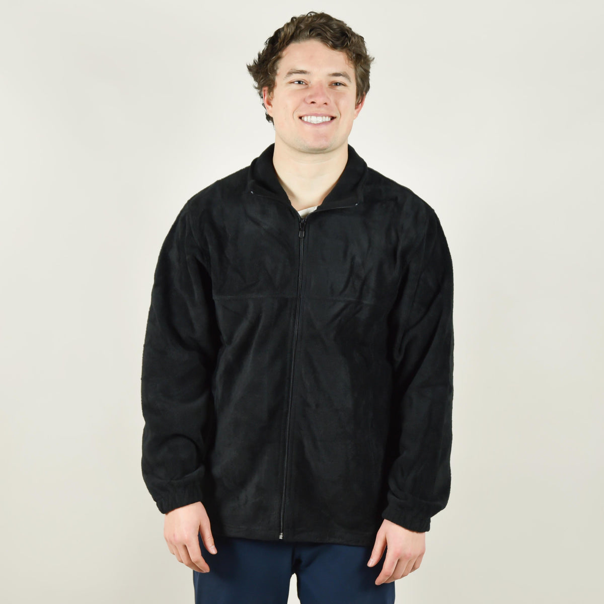 Model wearing Harriton M990 Fleece Full Zip