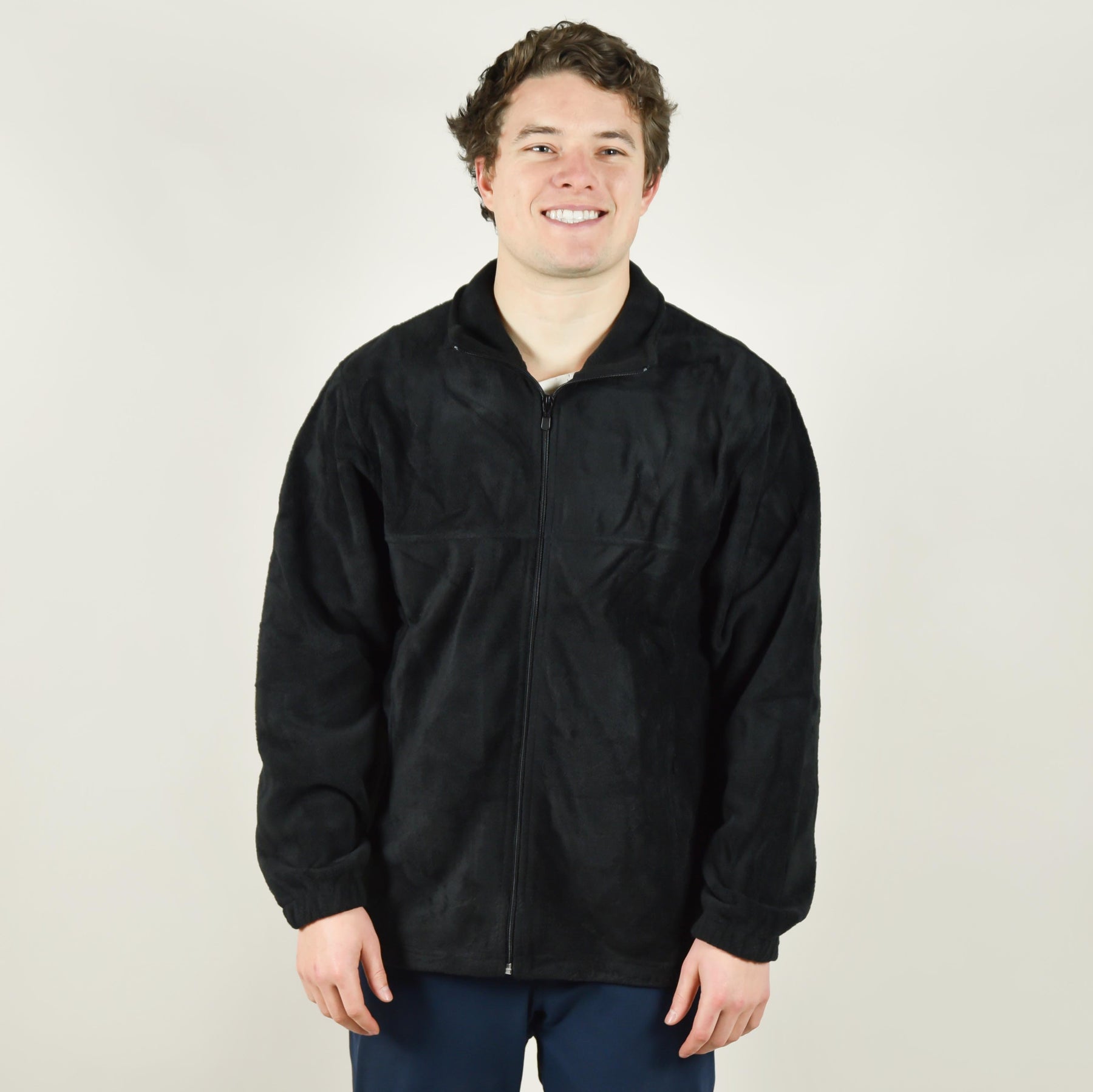 Model wearing Harriton M990 Fleece Full Zip